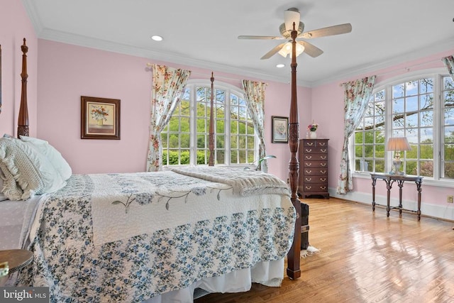  - bedroom with wood finished floors, baseboards, ornamental molding, a ceiling fan, and recessed lighting