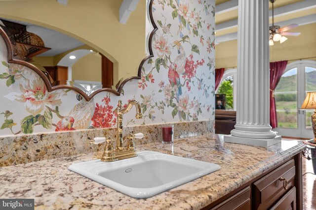  - bathroom with decorative columns and vanity