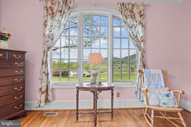  - sitting room with wood finished floors