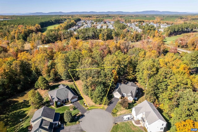 drone / aerial view with a forest view