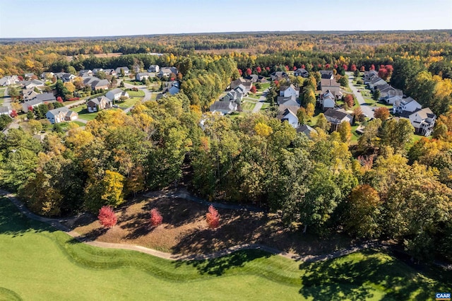 bird's eye view featuring a residential view and a view of trees