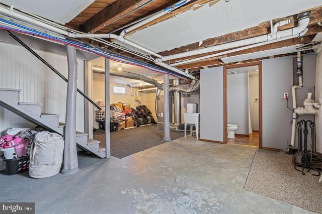 885 Main St W, Stanley, VA 22851 - unfinished basement featuring stairway
