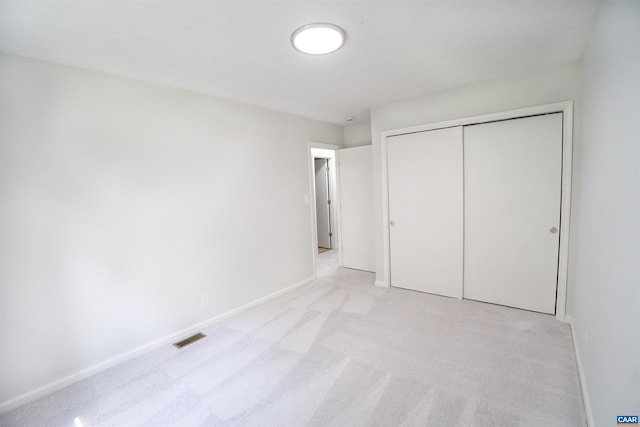 158 Scarborough Pl, Charlottesville, VA 22903 - unfurnished bedroom featuring light colored carpet and a closet