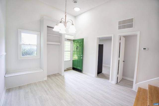 158 Scarborough Pl, Charlottesville, VA 22903 - unfurnished dining area with a chandelier and light wood finished floors