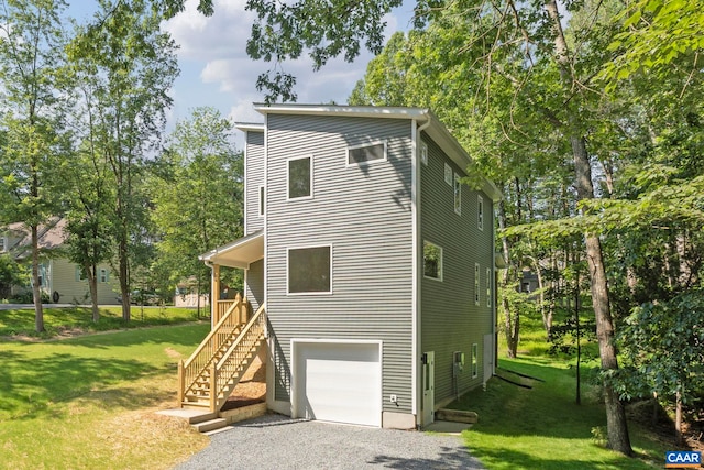 34 Turkeysag Trl, Palmyra, VA 22963 - view of front of property featuring driveway, a front lawn, an attached garage, and stairs