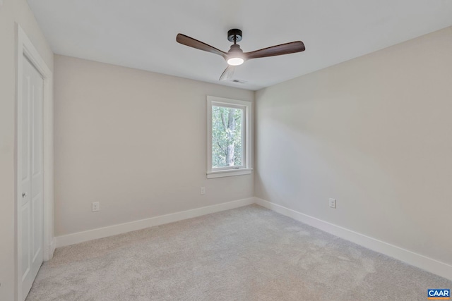 34 Turkeysag Trl, Palmyra, VA 22963 - unfurnished bedroom with light carpet, ceiling fan, and a closet