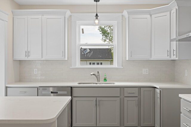 630 Battlefield Rd, Fort Defiance, VA 24437 - kitchen with a sink, backsplash, light countertops, pendant lighting, and gray cabinetry