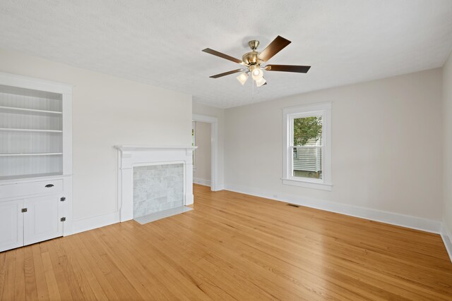 630 Battlefield Rd, Fort Defiance, VA 24437 - unfurnished living room featuring light wood finished floors, a ceiling fan, and baseboards