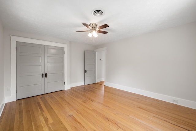 630 Battlefield Rd, Fort Defiance, VA 24437 - unfurnished bedroom featuring baseboards, light wood finished floors, a ceiling fan, and a closet