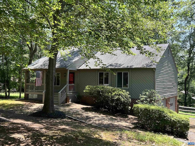 7 Englewood Dr, Palmyra, VA 22963 - view of front of house featuring roof with shingles and a garage