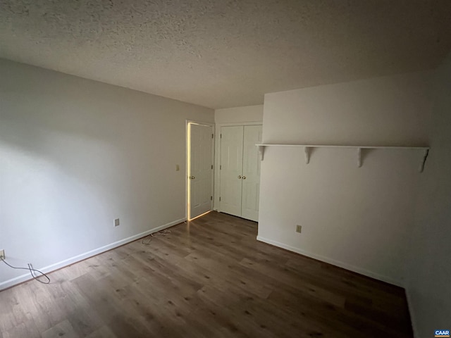7 Englewood Dr, Palmyra, VA 22963 - unfurnished room with wood finished floors and a textured ceiling