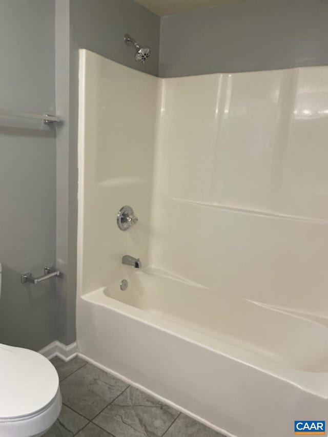 1414 Midland St, Charlottesville, VA 22902 - bathroom with toilet, shower / tub combination, and baseboards