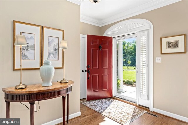 10042 Cedar Spring Ln, Culpeper, VA 22701 - foyer with crown molding and wood finished floors