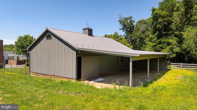 10042 Cedar Spring Ln, Culpeper, VA 22701 - view of side of home with a carport and a metal roof