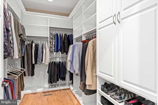 10042 Cedar Spring Ln, Culpeper, VA 22701 - walk in closet featuring wood finished floors