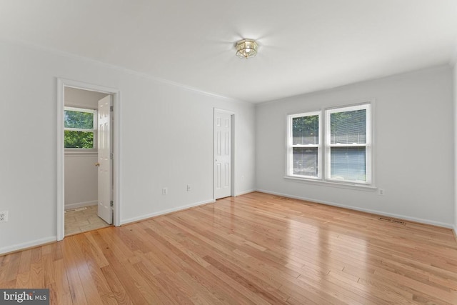 11505 Brian Dr, Fredericksburg, VA 22407 - unfurnished bedroom featuring wood finished floors, a closet, ornamental molding, and ensuite bath