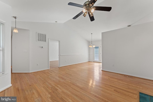 11505 Brian Dr, Fredericksburg, VA 22407 - spare room with vaulted ceiling, ceiling fan, and light wood-type flooring