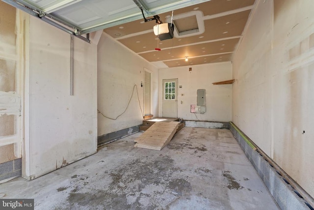 11505 Brian Dr, Fredericksburg, VA 22407 - garage featuring a garage door opener and electric panel