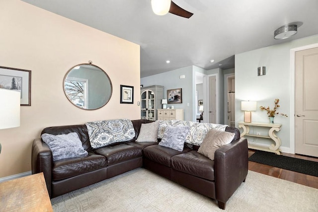 living area with recessed lighting, baseboards, wood finished floors, and a ceiling fan