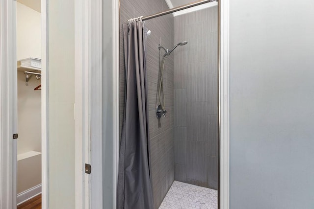 full bath featuring a stall shower