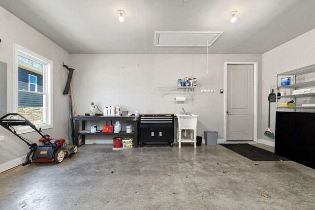 garage featuring baseboards