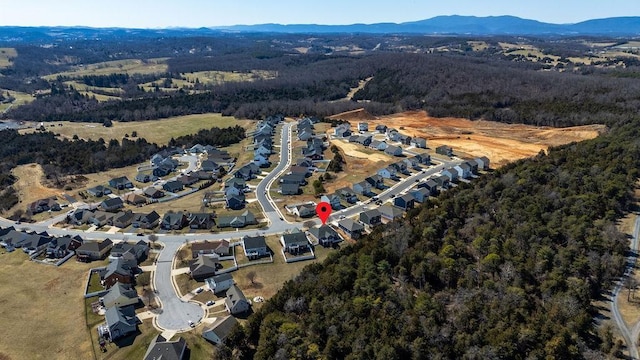 aerial view featuring a mountain view and a residential view