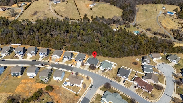 birds eye view of property with a residential view