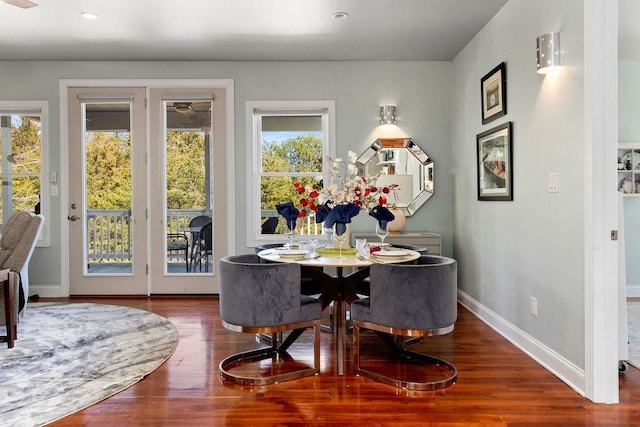 dining room featuring recessed lighting, baseboards, and wood finished floors