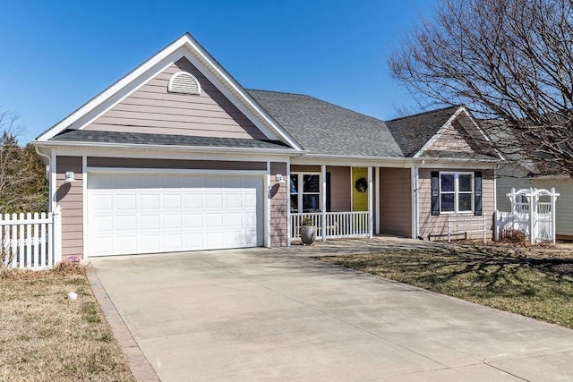 single story home with a shingled roof, fence, covered porch, a garage, and driveway