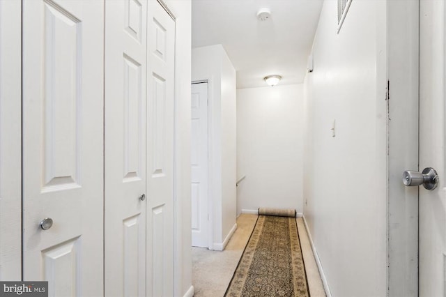 5200 Sweet Gum Ter, Fredericksburg, VA 22407 - hallway featuring baseboards and an upstairs landing