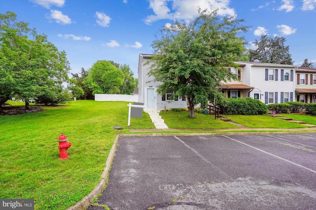 5200 Sweet Gum Ter, Fredericksburg, VA 22407 - exterior space with a lawn and uncovered parking