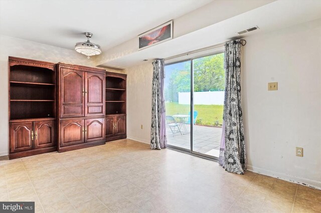 5200 Sweet Gum Ter, Fredericksburg, VA 22407 - unfurnished living room featuring baseboards