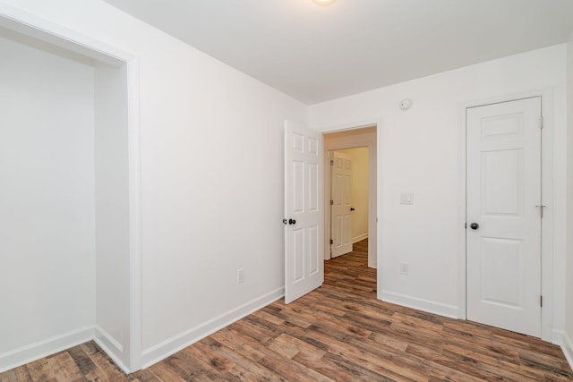 9048 Cinder Run Ln, Elkton, VA 22827 - unfurnished bedroom featuring wood finished floors and baseboards