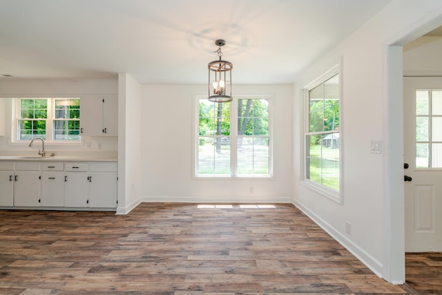 9048 Cinder Run Ln, Elkton, VA 22827 - unfurnished dining area with a sink and dark wood finished floors