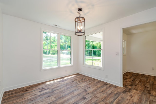 9048 Cinder Run Ln, Elkton, VA 22827 - unfurnished room featuring wood finished floors, plenty of natural light, and a chandelier