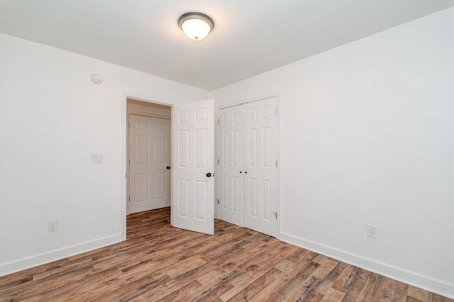 9048 Cinder Run Ln, Elkton, VA 22827 - unfurnished bedroom with wood finished floors and a closet