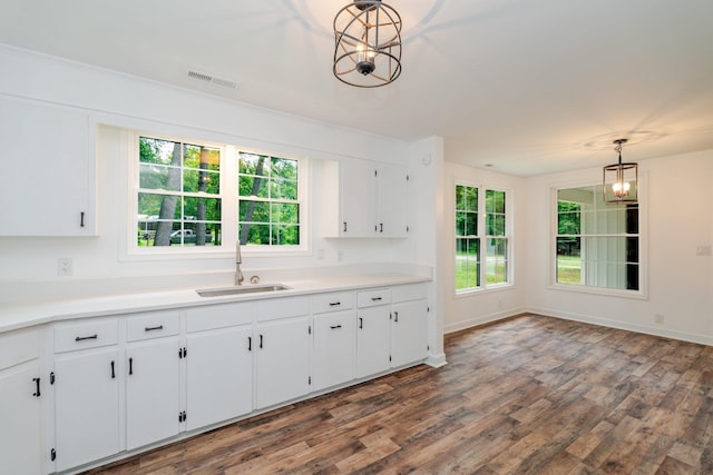 9048 Cinder Run Ln, Elkton, VA 22827 - kitchen with white cabinets, healthy amount of natural light, dark wood-style flooring, and light countertops
