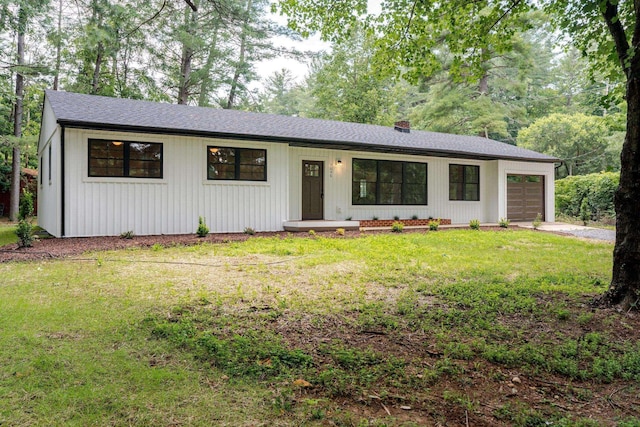 9048 Cinder Run Ln, Elkton, VA 22827 - view of front facade with a garage, a front yard, a chimney, and driveway