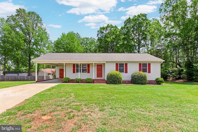 single story home featuring driveway and a carport