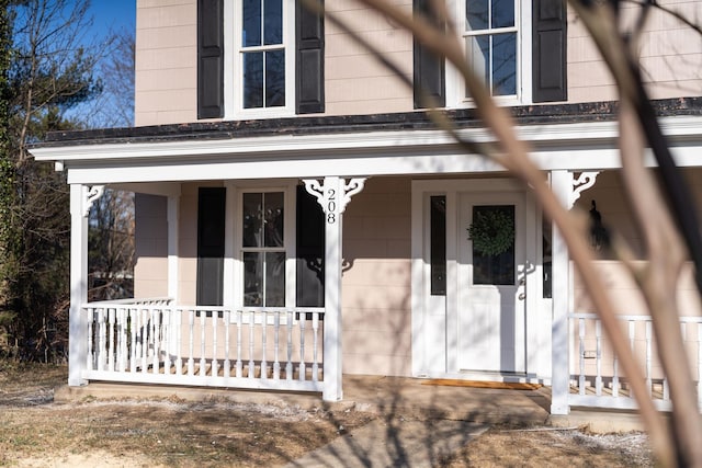 entrance to property with a porch