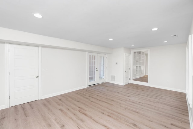 interior space with light hardwood / wood-style flooring and french doors