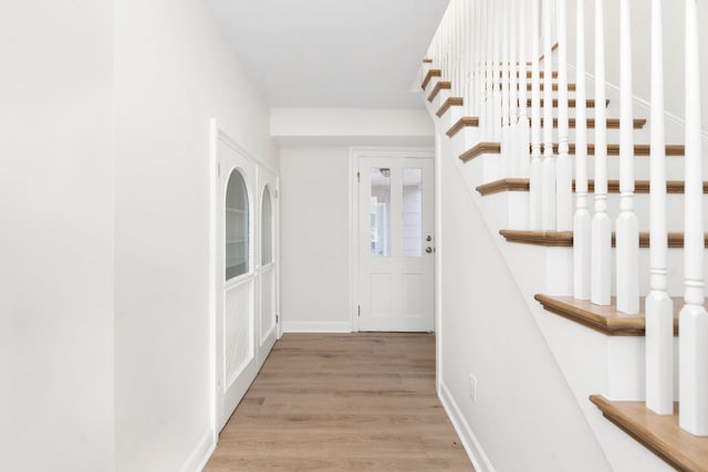 hall featuring light wood-type flooring