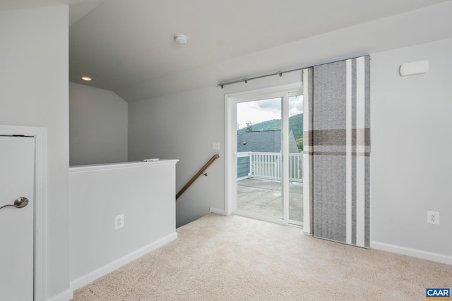 3215 Bergen St, Charlottesville, VA 22902 - carpeted spare room featuring vaulted ceiling and a smoke detector