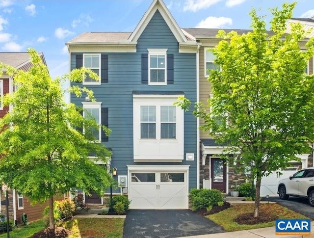 3215 Bergen St, Charlottesville, VA 22902 - townhome / multi-family property featuring driveway and a garage
