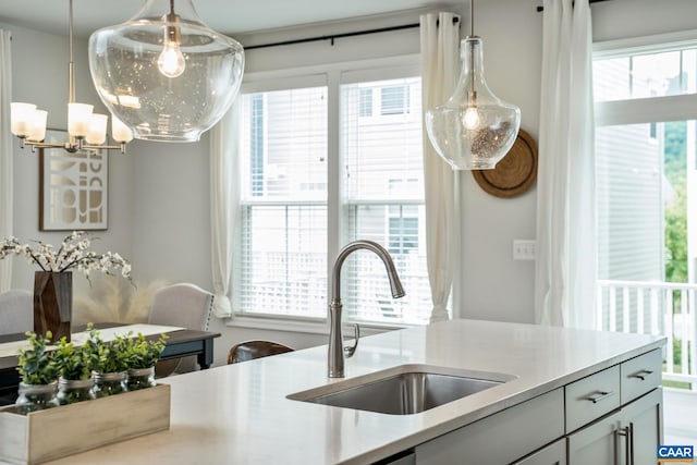 3215 Bergen St, Charlottesville, VA 22902 - kitchen with a chandelier, pendant lighting, and light countertops