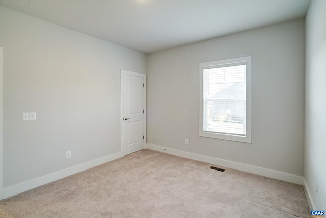 1658 Koch Ct, Charlottesville, VA 22911 - empty room with light carpet, baseboards, and visible vents