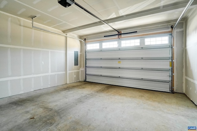 1658 Koch Ct, Charlottesville, VA 22911 - garage featuring electric panel and a garage door opener