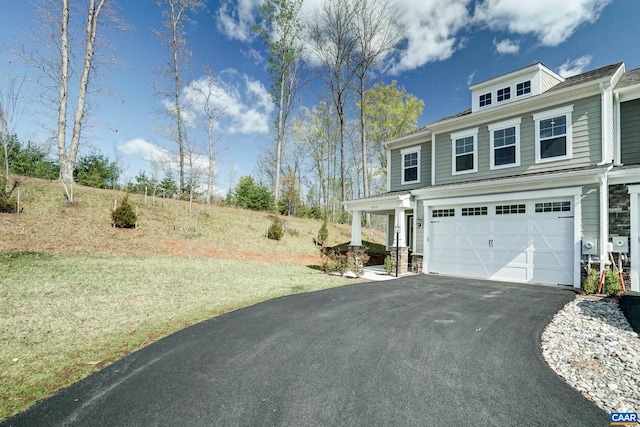 1658 Koch Ct, Charlottesville, VA 22911 - view of property exterior with driveway, a garage, and stone siding
