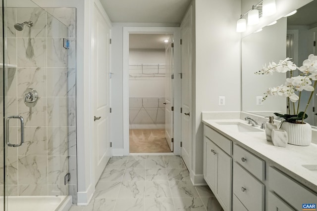 1658 Koch Ct, Charlottesville, VA 22911 - full bath with double vanity, a stall shower, a sink, marble finish floor, and a spacious closet
