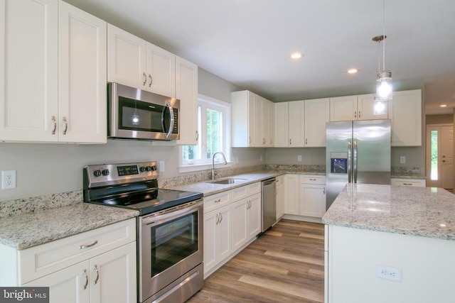 130 Almond St S, Orange, VA 22960 - kitchen featuring a sink, stainless steel appliances, recessed lighting, light wood finished floors, and white cabinetry